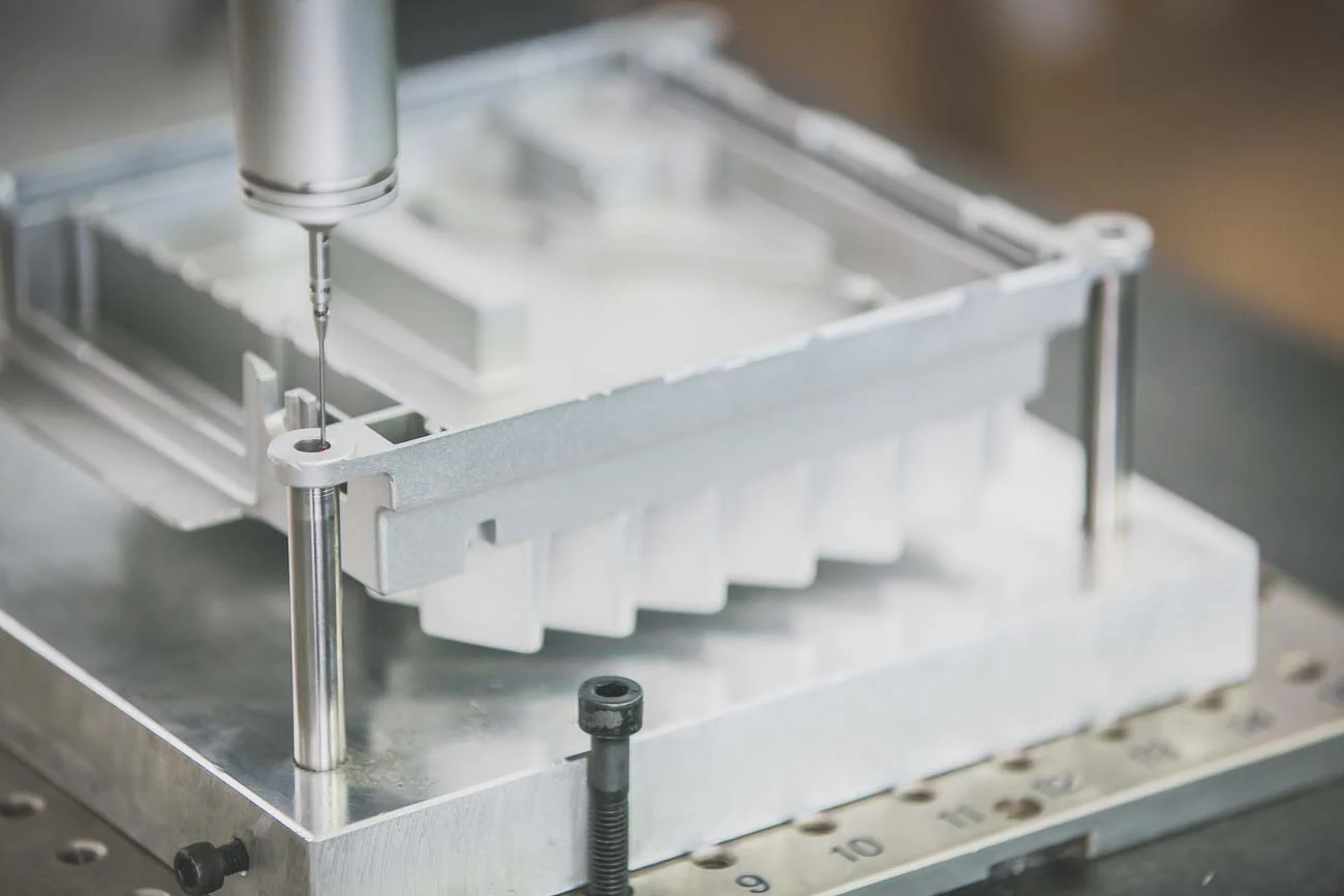 Actual RIVIMETAL CMM equipment measuring an aluminium casting